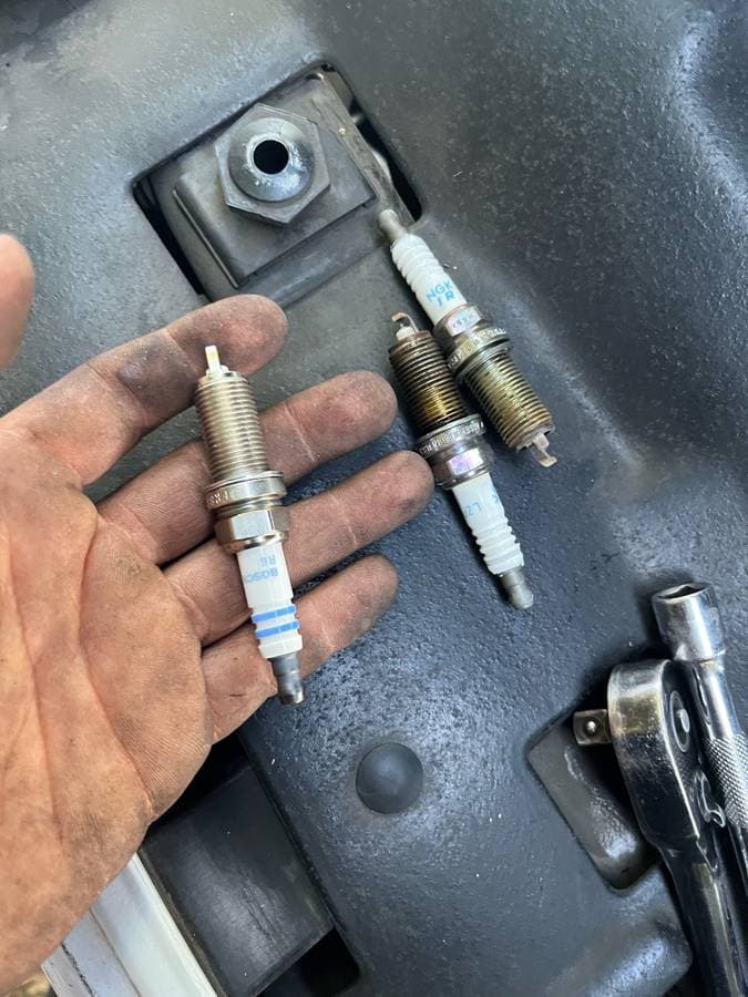 Vehicle exterior before detailing showing dirt and road buildup